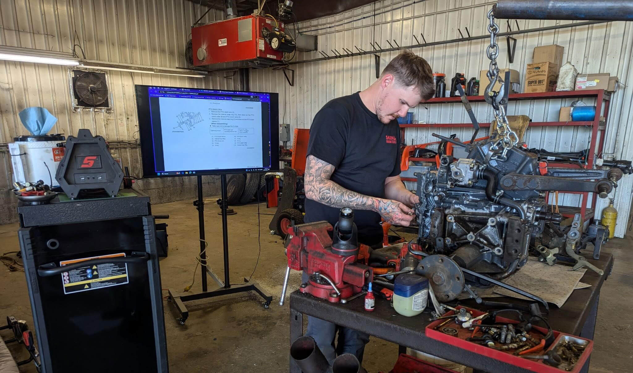 Man Servicing Equipment